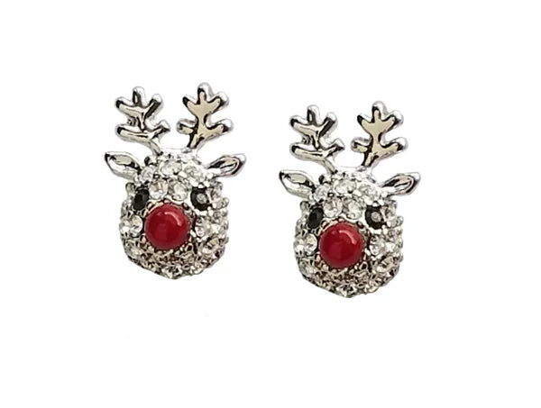 Pair of silver reindeer-shaped earrings with rhinestone faces and red enamel noses on a white background